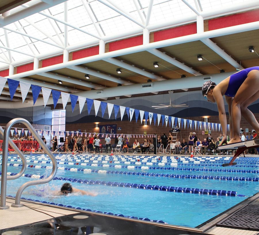 Swimming at the league meet. 